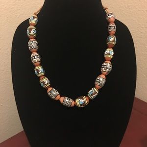 Tumi Peruvian hand painted ceramic clay necklace.